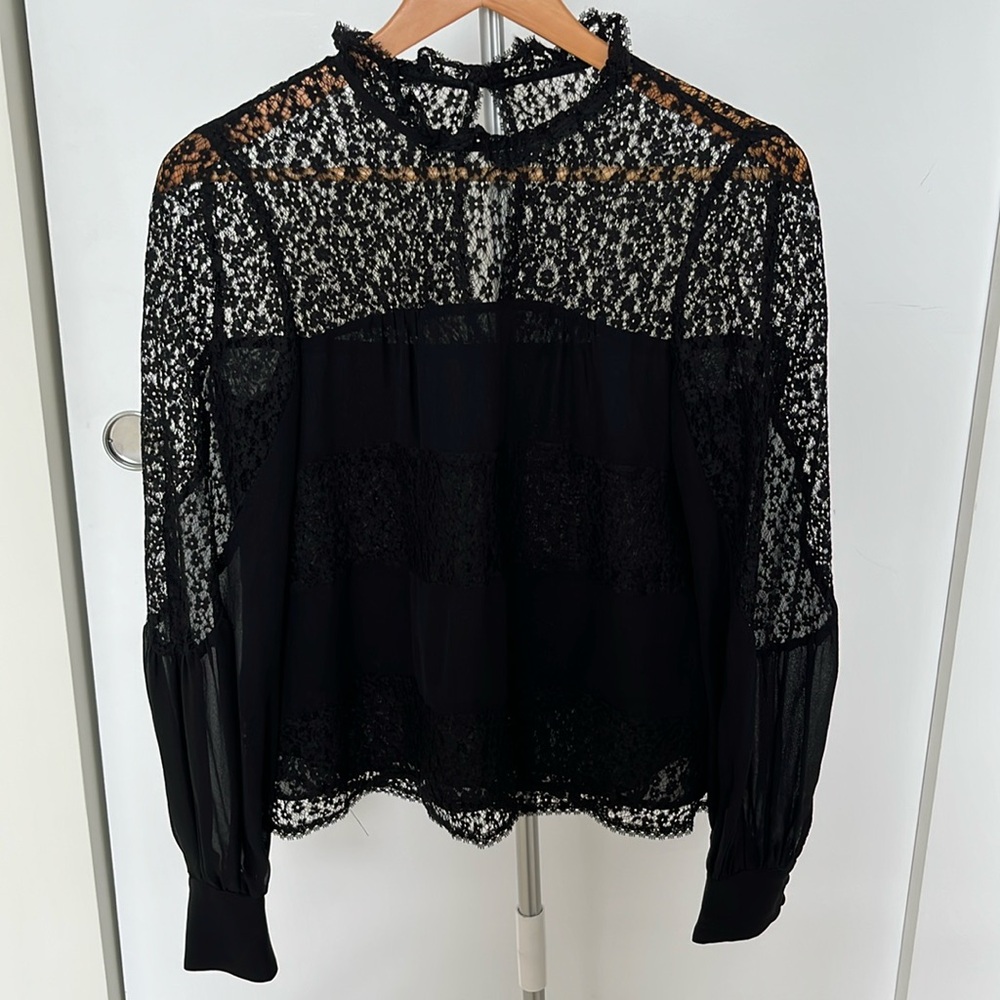 Long sleeve lace and silk blouse.